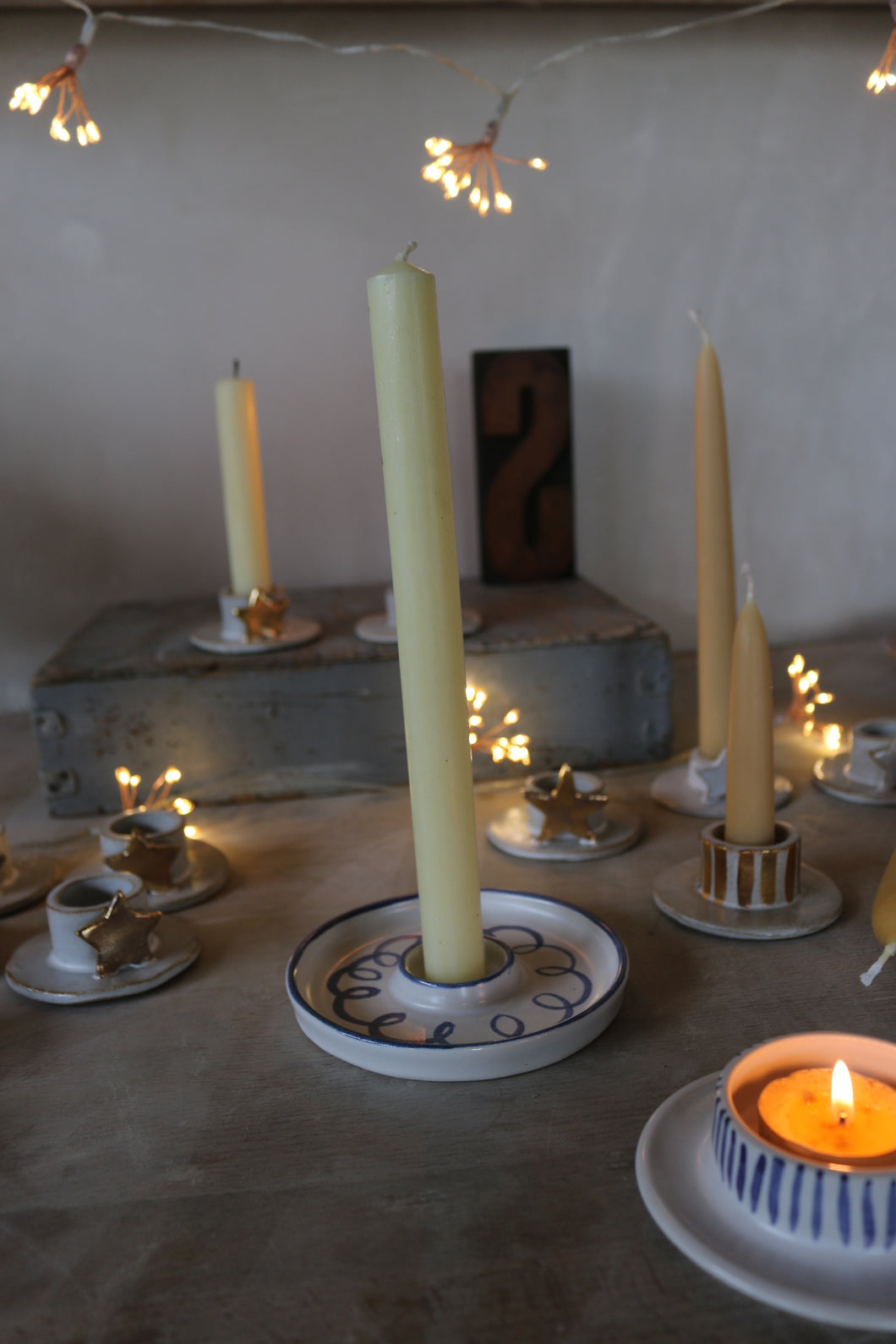 Standard candle holder with curly whirlers
