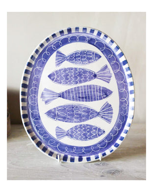 Laura Lane stoneware blue and white fishy plate