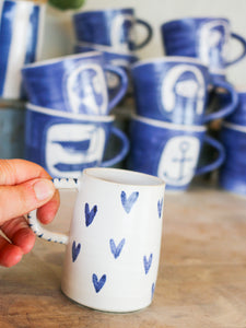 Lovely little cup with hearts & stripy handle
