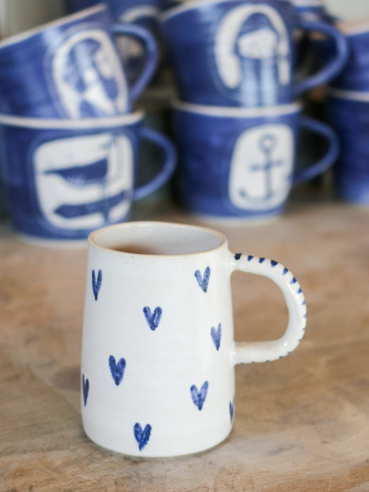 Lovely little cup with hearts & stripy handle