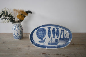 Oval plate with fatty catty and rude seagull
