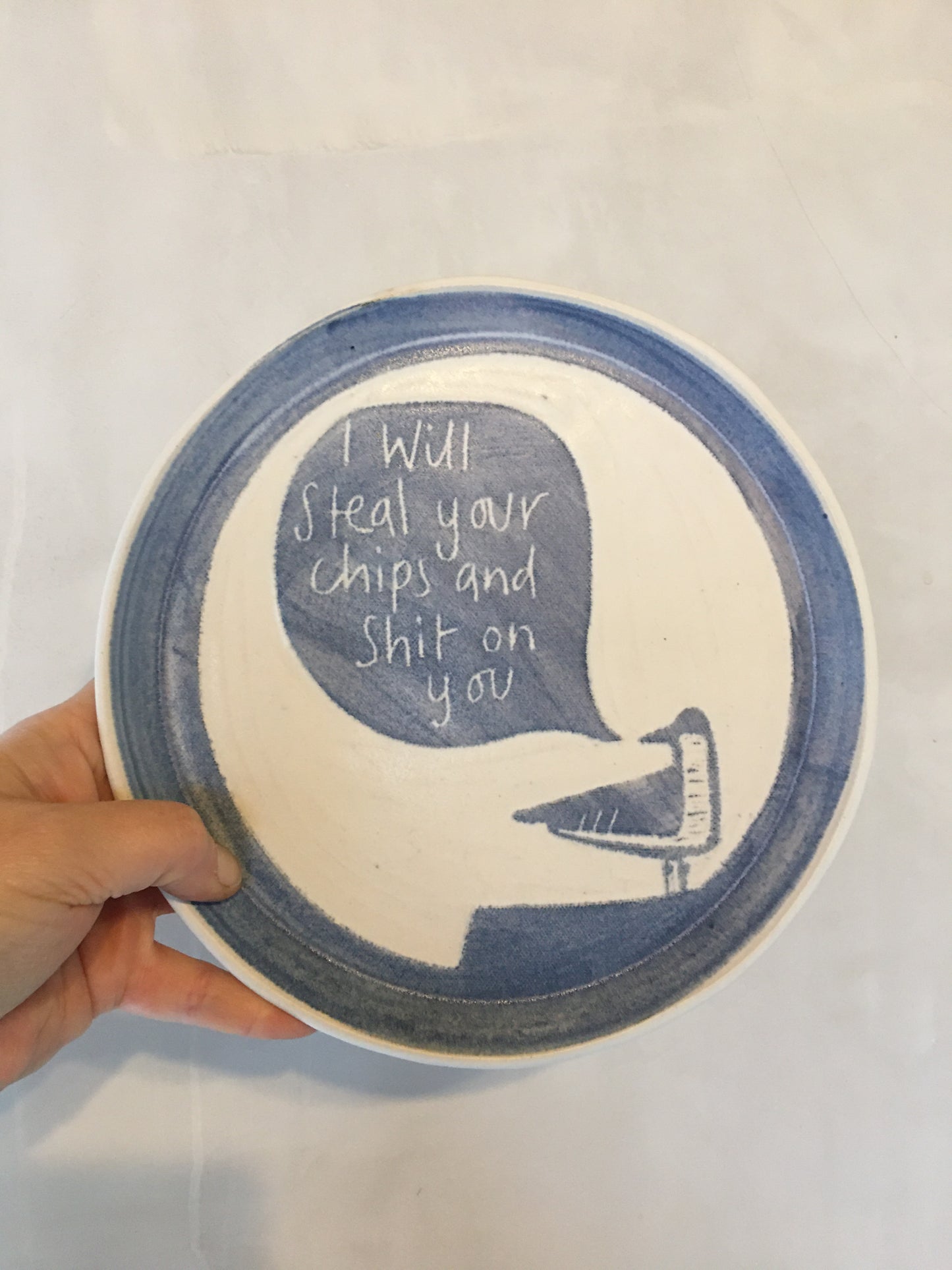 “I will steal your chips and shit on you”  plate