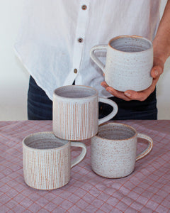 Simple white stoneware mug